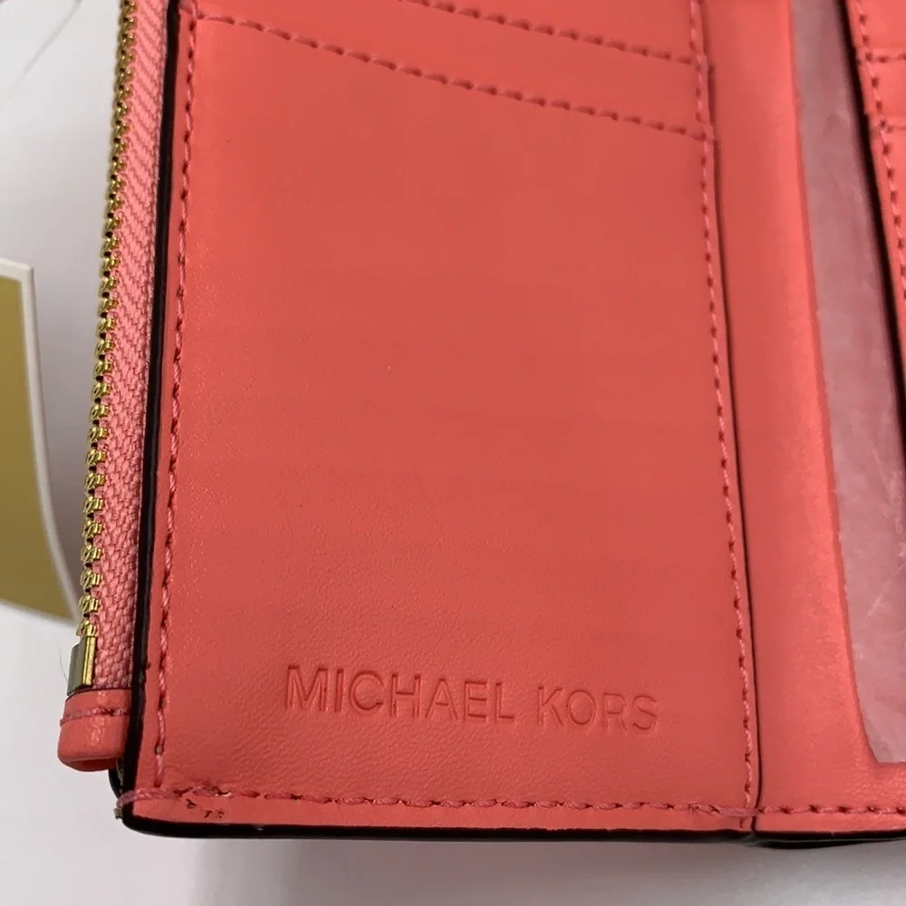 NWT MICHAEL KORS CARMEN MEDIUM FLAP BIFOLD WALLET GRAPEFRUIT COLOR
